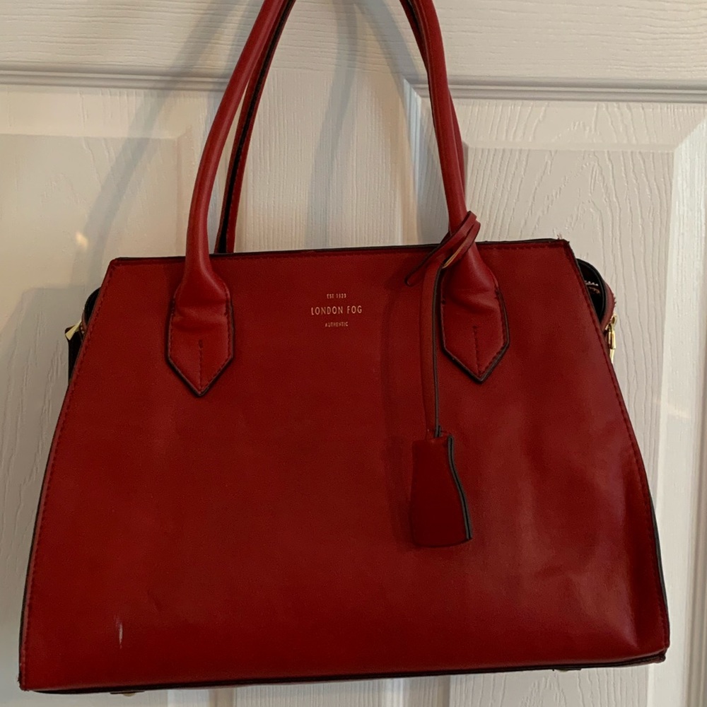 Gently used red London Fog Satchel with suede tan lining.